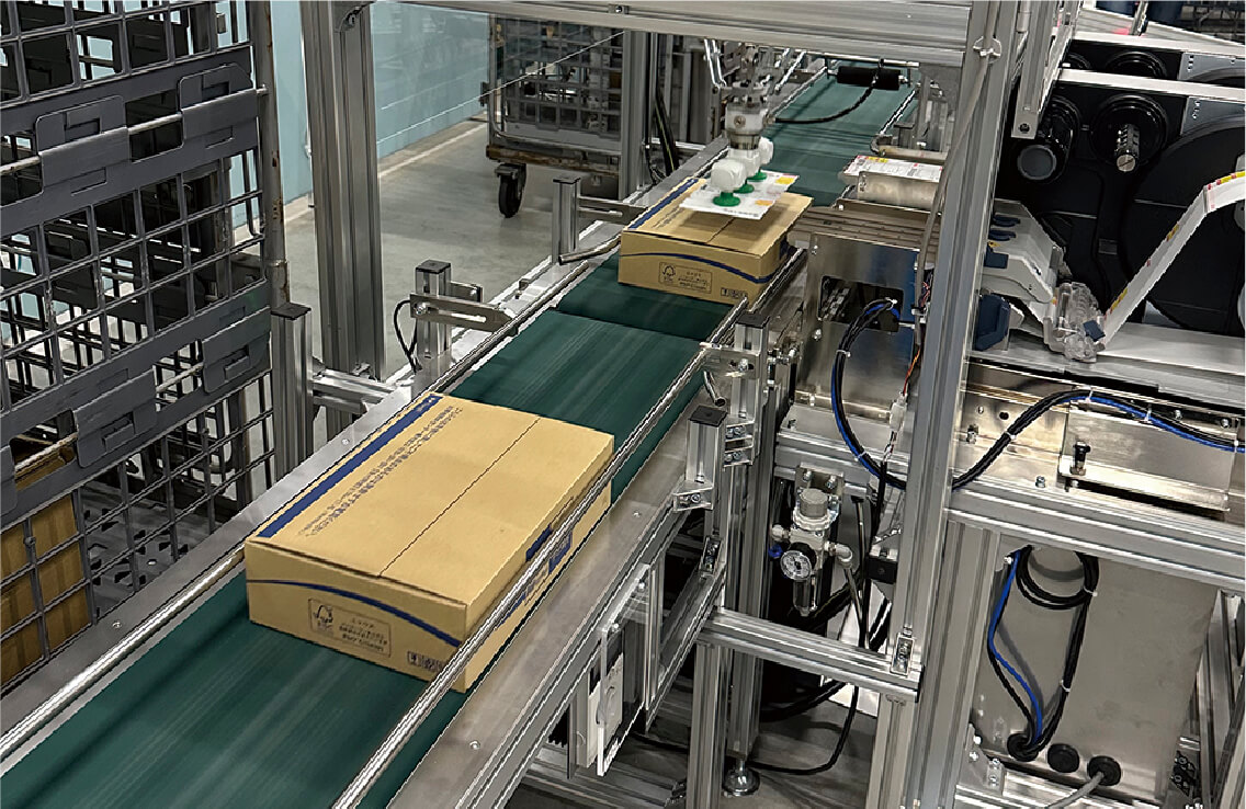 自動梱包ライン（宅配便用）